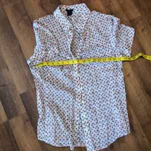 White Blouse with brown and coral pattern.